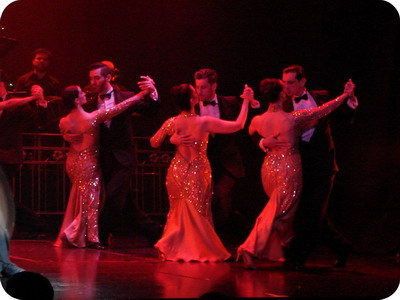 Mansión Tango Show in Buenos Aires dancers in a group choreography Mansión Tango Show in Buenos Aires dancers in a group choreography with elaborated costumes